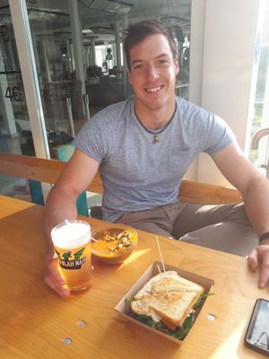 My brother just a second before all the food disappeared  at Kucha in Ljubljana