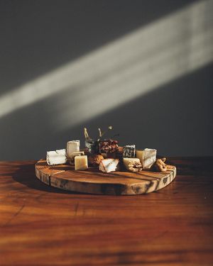 Plant based cheese and sausages plate at Kucha in Ljubljana
