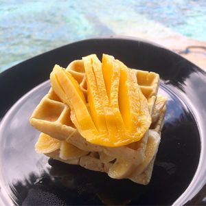 Vegan waffles with banana and mango  at Freediving Planet  in Moalboal