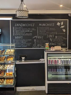 Menu and donuts at V Food Spot in London