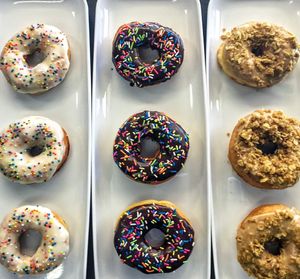 Fresh doughnuts made by their award winning baker at V Food Spot in London