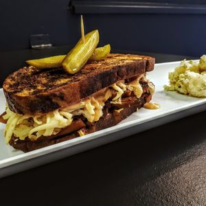 Smoked tofu Reuben with potato salad at V Food Spot in London