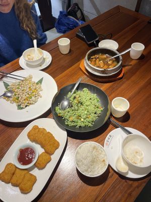 Vegan chicken nuggets, tofu with mushrooms, rice with veggies, corn, peas and glutinous rice   at Ji Ming Temple Vegetarian Diet in Nanjing