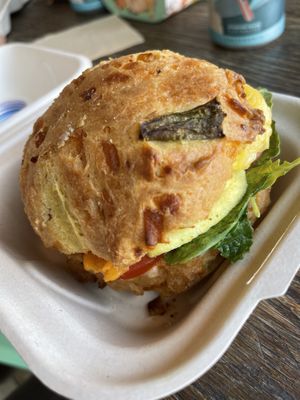 Herb & Cheddar Biscuit Breaky Sandwich with eggplant bacon. at Soulshine in San Diego