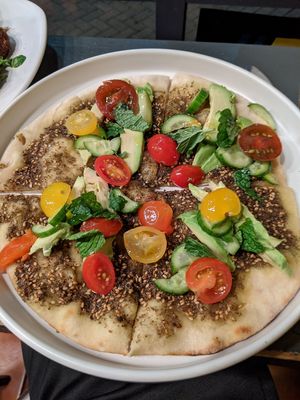 Za'atar Man'oushe with avocado and veggies at Reem's in San Francisco