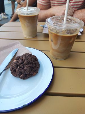 Iced oat latte and triple chocolate cookie at Society Cafe - High St in Bath
