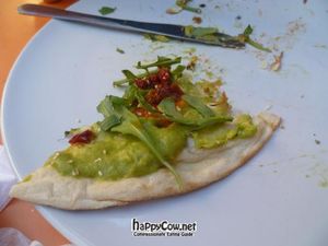 avocado rucola dried tomato naan pizza! at W Der Imbiss - Prenzlauer Berg in Berlin
