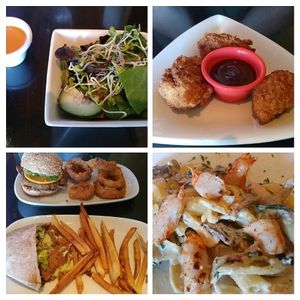 House salad, buffalo drum sticks, King's burger, gyro, and penne pasta with un-shrimp at The Queen's Table Vegan Cuisine  in El Paso