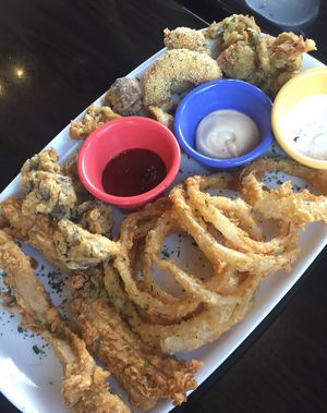 Batter sampler platter. Fried unchicken, mushrooms, unshrimp, onion, jalapeño  at The Queen's Table Vegan Cuisine  in El Paso