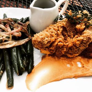 Deep Fried UnChicken, Sweet Potato Mousse & Green Beans in a Rosemary Sauce.  at The Queen's Table Vegan Cuisine  in El Paso