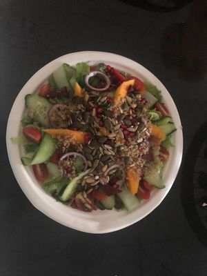 Mango. quinoa, pomegranate and seeds salad.  at Buzz Organic Food & Drink in Ao Nang