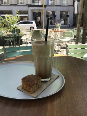 iced chai latte and a piece of cake at Tibits in St Gallen