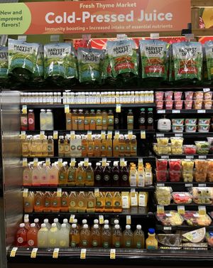 There are about a dozen or so cold-pressed juices available by the refrigerated produce, made in-house under the Fresh Thyme label. at Fresh Thyme Farmers Market in St Louis Park