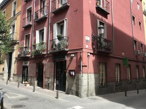 Look for the pinkish building on the corner  at La Biotika in Madrid