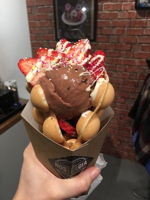 HK BUBBLE WAFFLE: Oreo ice cream, white chocolate, strawberries and sprinkles at Nosteagia in West London