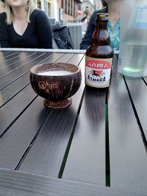 Asmara beer with coconut cup at Mama Afrika in Kassel