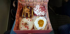 Peanut chocolade, red velvet cream cheese, white chocolate strawberry and mango cheesecake donut (and me, now diabetic) at Brammibal's Donuts - Prenzlauer Berg in Berlin