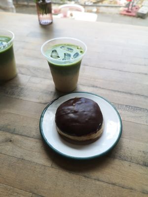 Boston cream donut with iced matcha latte at Brammibal's Donuts - Prenzlauer Berg in Berlin