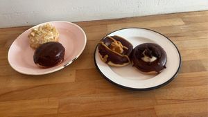 Right: almond, Boston cream
Left: peanut chocolate, cookie and cream at Brammibal's Donuts - Prenzlauer Berg in Berlin