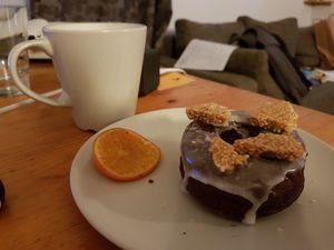 Chocolate and Tahini to take away (that's not the cafe in the background!) at Brammibal's Donuts - Prenzlauer Berg in Berlin