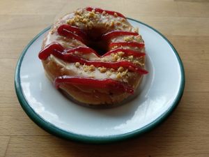 Peanut butter and jelly donut for breakfast. at Brammibal's Donuts - Prenzlauer Berg in Berlin