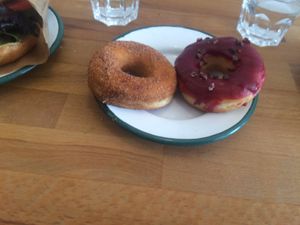 The red current cocoa nib donut and the classic cinnamon sugar donut  at Brammibal's Donuts - Prenzlauer Berg in Berlin