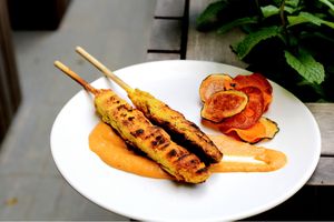Soy satay, peanut sauce, veggie chips. Photo provided by HRVST  at HRVST by Kilter Avenue in Central Singapore