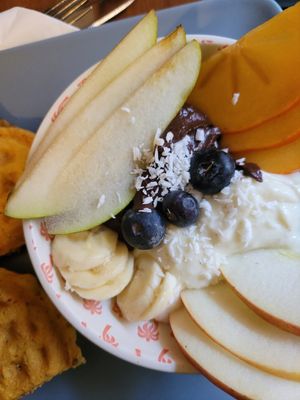 waffles, coconut yogurt with fruit at Bez Lukru in Wroclaw