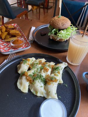 Russian dumplings, baked sweet potatoes, portobella burger  at Bez Lukru in Wroclaw