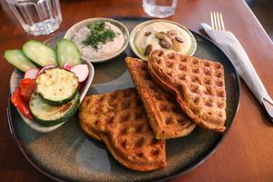 savoury waffles with hummus and sunflower spread at Bez Lukru in Wroclaw