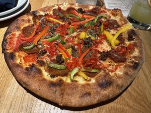 Vegan Pepperoni & Peppers
red sauce, vegan cheese, vegan pepperoni, bell peppers, peppadew peppers, parsley & thyme  at Harvest Pizzeria in Dublin