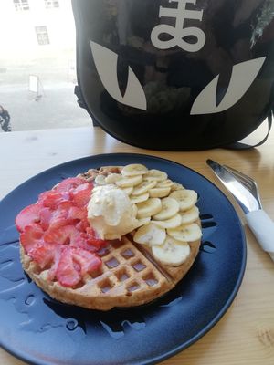 Waffle with vegan cream, strawberries and banana   at Ovegano in Brno