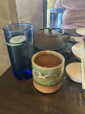 Orange tea and water they will add more hot water to the kettle if they ever come back to your table , busy or not busy   at Blue Sushi Sake Grill in Indianapolis