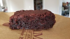 Vegan brownie ($4). Pretty good. Moist. Not too sweet. at Graham's 318 Coffeehouse in Geneva