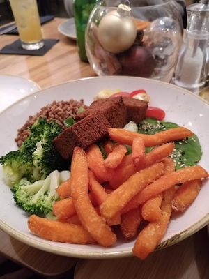 falafel and sweet potatoes fries salad! at Cafe Elektric in Prague
