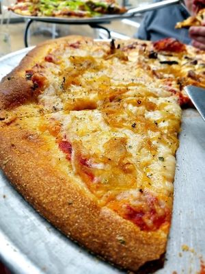 Vegan thin crust pizza with daiya cheese and caramelized onion at Pi Pizzeria - Downtown in St Louis