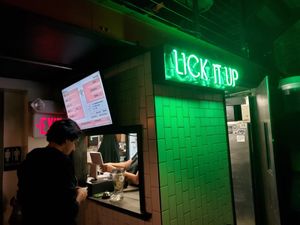 It's a small hole in the wall kitchen in the back of the bar at Lick It Up - International Bar in El Paso