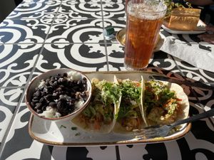 Cauliflower Chimichurri Taco 🌮 side of beans and rice! Delicious ! at Third Culture Kitchen in Titusville