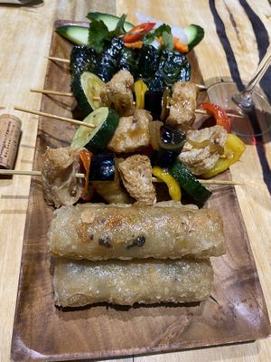 Special tasting menu: mushrooms in betel leaves, grilled skewers with sticky sauce, spring rolls  at Xich Lo in Hornchurch