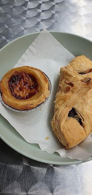 this left thing, pasteis de nata, is amazing at Moko Veggie Cafe - Anjos in Lisbon