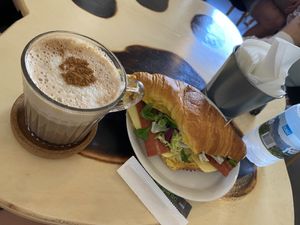 Croissant and Cappuccino   at Moko Veggie Cafe - Anjos in Lisbon