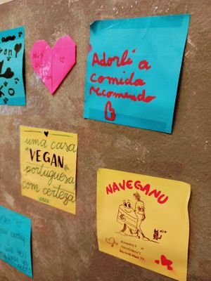 Cute wall notes and art. at Moko Veggie Cafe - Anjos in Lisbon