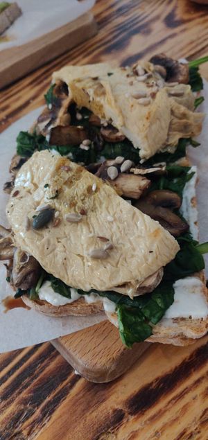 Spinach mushroom toast with extra soy egg at Moko Veggie Cafe - Anjos in Lisbon