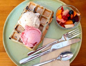 Blueberry waffle with icecream and fresh fruit at art & wEISe in Monheim Am Rhein