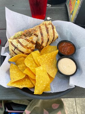 Vegan burrito (had Beyond crumbles and vegan cheese). Chips with salsa and vegan baja sauce at Colley Cantina in Norfolk