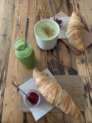 Croissants with jam, matcha latte and green smoothie   at Kaffee Ingwer in Berlin
