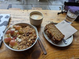 Granola bowl, bananabread, cappuccino at Kaffee Ingwer in Berlin