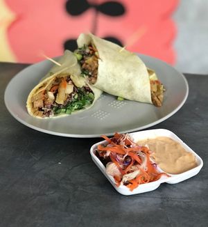 All our wraps are served with vegan mayo dipping sauce & curtido slaw.  at Kitty Cafe in Koh Lanta