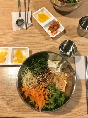Rice, spinach, beansprouts, carrot, salad, pickled radish, tofu and spicy sauce at Bibiri 2 - 비비리2 in Seoul