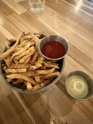 Fries with vegan wasabi mayo from sister restaurant across the street (Ptarmigan)  at Tundra Inn in Churchill